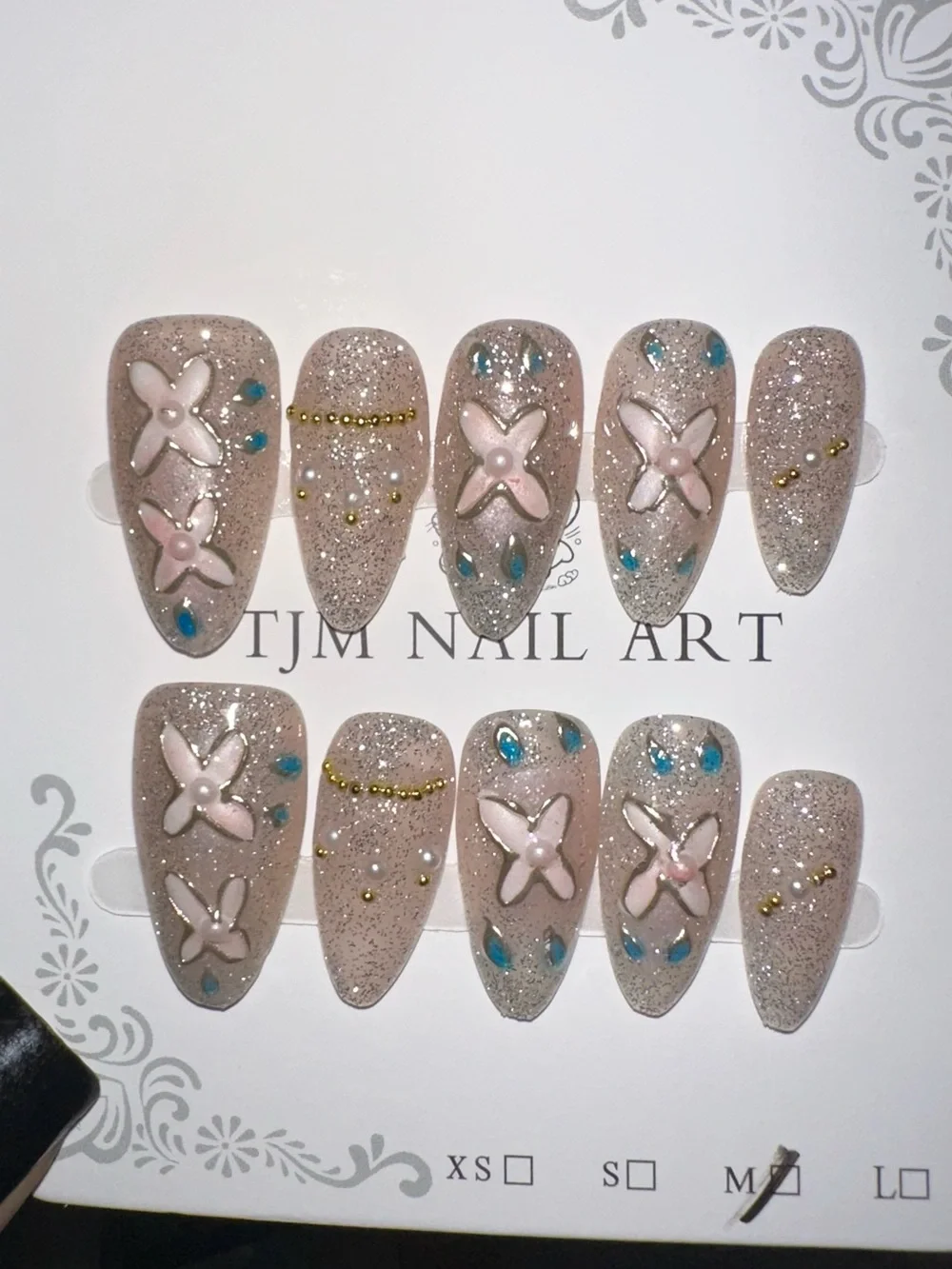 100 Sets of SURPRISE Assorted Press-On Nail Sets - Floral, Pink, Blue, Neutral